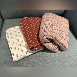 Name brand baby blankets: parade, itzy ritzy, zesst organics.